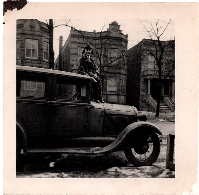 Ellis Schuman on Morton Schuman's car, 1939 West Side Chicago