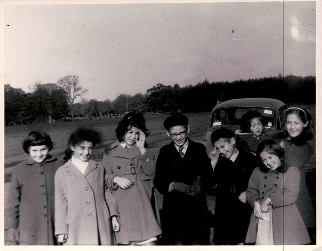 Left to Right: Beba Feldbrand, Eva Mermelstein, Rachel Bleier, Chaim Bleier, Shaya Bleier, baby Tuly Bleier, Esther Bleier, and Sarah Bleier Phoenix Park, Dublin, Ireland, 1960