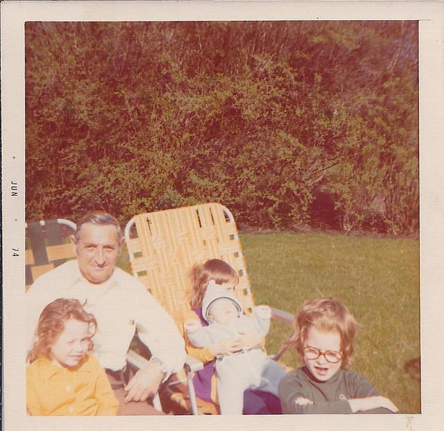 Markus Weiss w Rachel Weiss Feit, Miriam Weiss Anton holding Yitzi Weis, and Rivka Weiss Goldstein, 1974